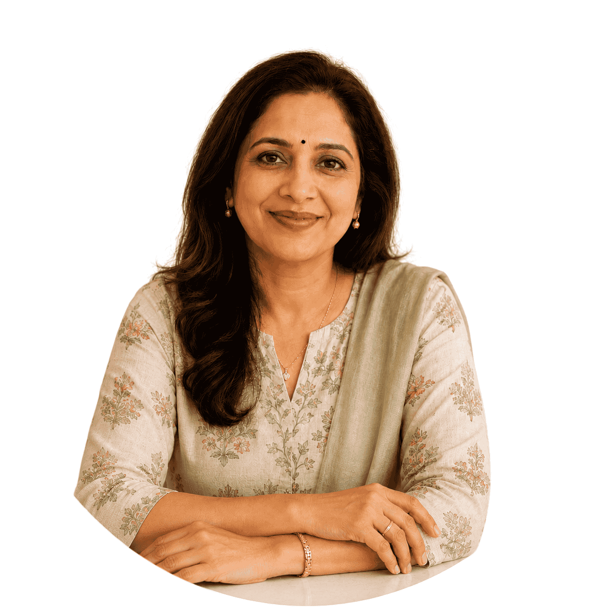 Kriti, a warm Indian health coach in a floral kurta